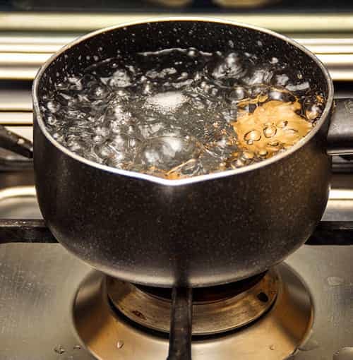 Boiling water for ice